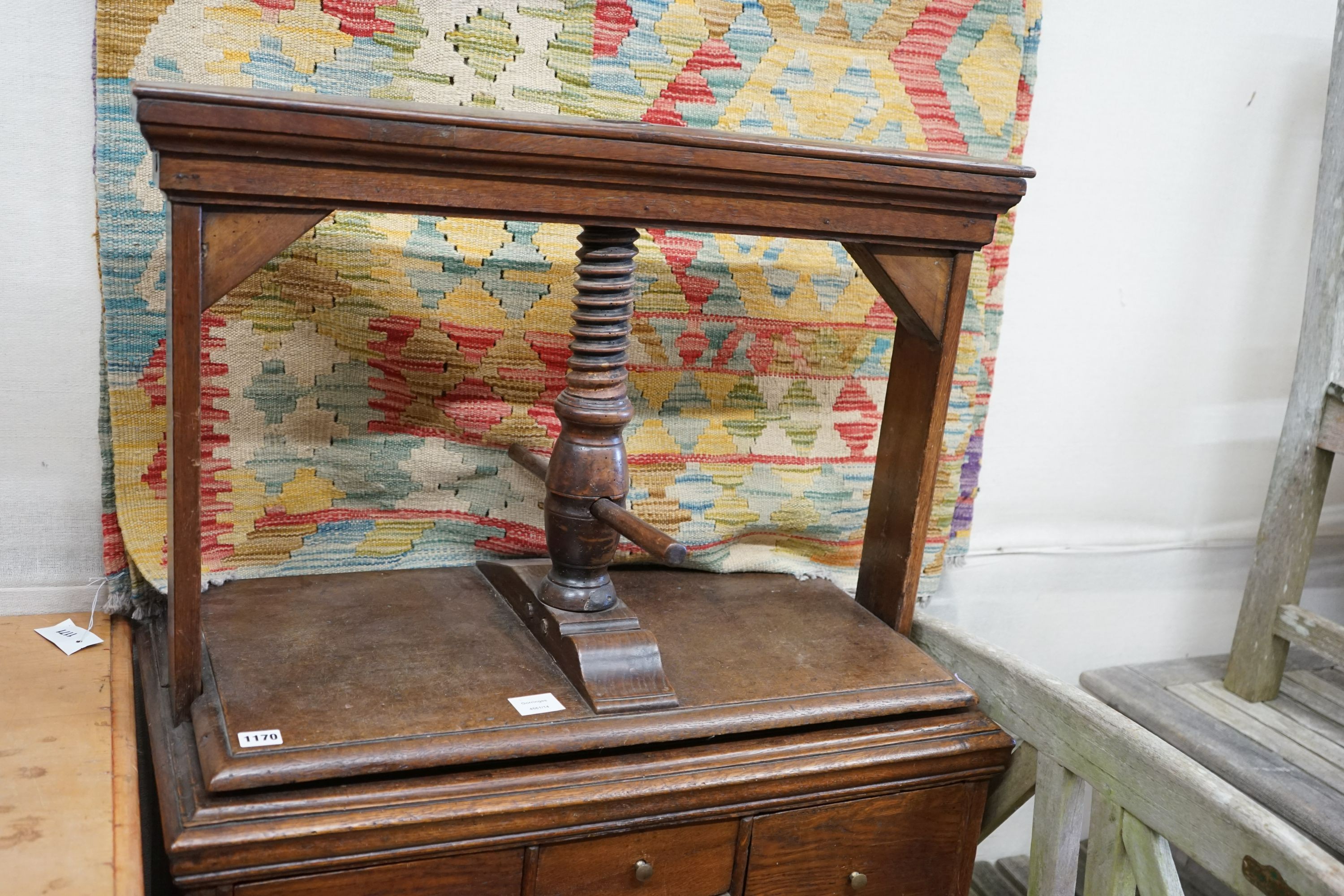 A George III provincial oak linen press, width 76cm, depth 42cm, height 140cm